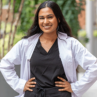 smiling female pharmacists - Review and Recertification Reward Program (RRRP)