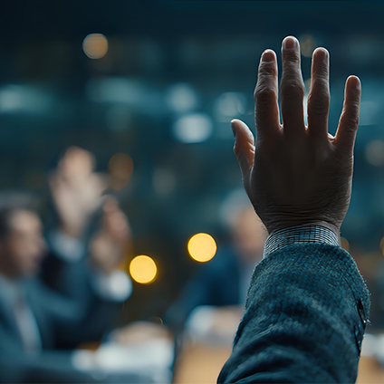 person raising their hand