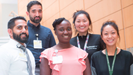 group of diverse individuals on a staircase